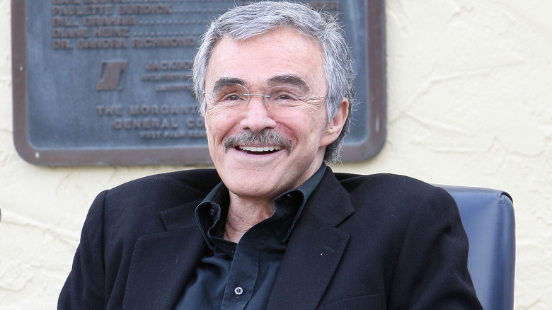 Burt Reynolds smiling in West Palm Beach in 2010