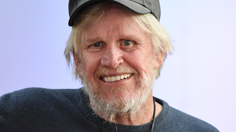 Gary Busey smiling in hat in Hollywood in 2021