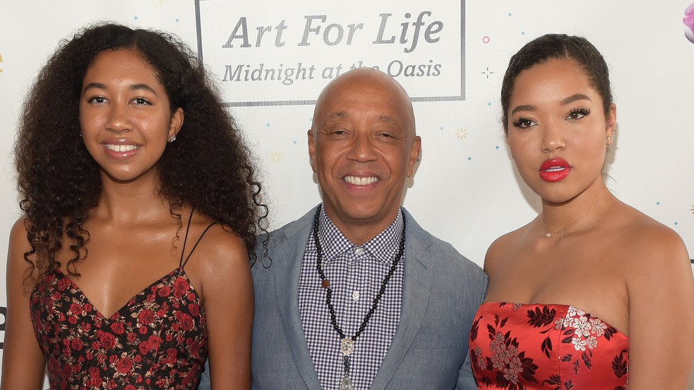 Russell Simmons with his daughters, Ming and Aoki 