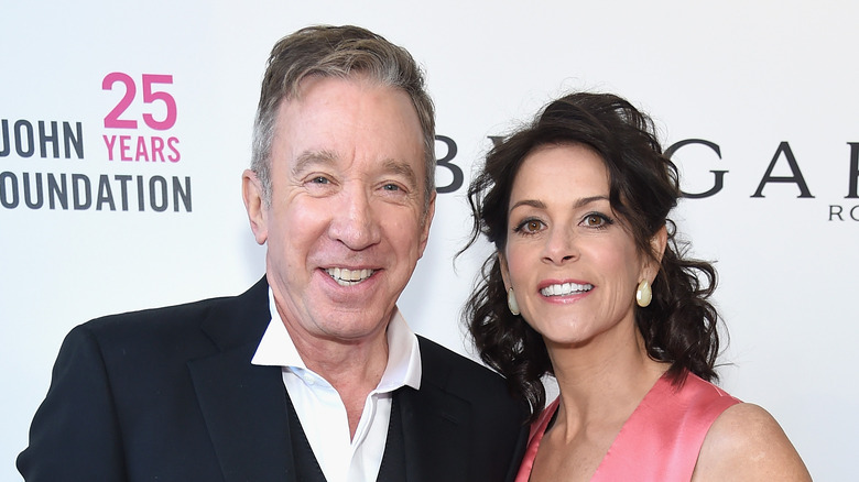 Tim Allen and Jane Hajduk smiling