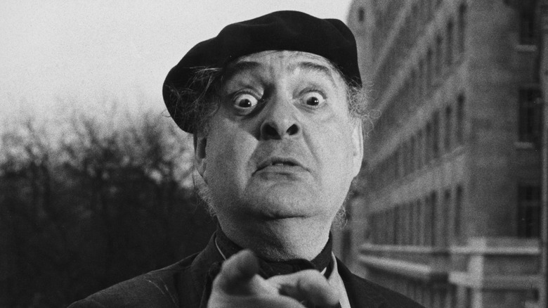 Zero Mostel pointing finger at camera