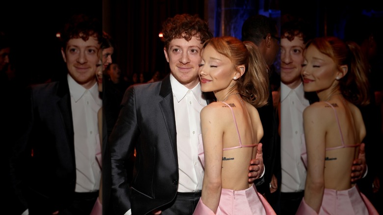 Ethan Slater and Ariana Grande posing