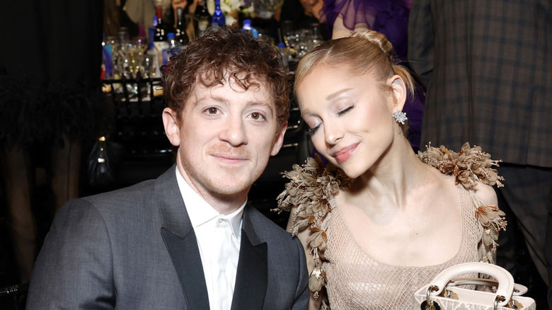 Ethan Slater and Ariana Grande smiling