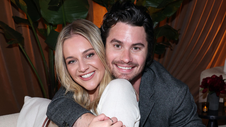 Chase Stokes hugging Kelsea Ballerini