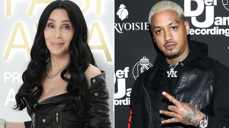 Cher wearing all black, Alexander Edwards on the red carpet