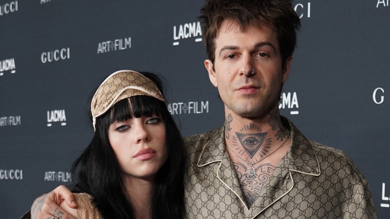 Billie Eilish and Jesse Rutherford wearing Gucci