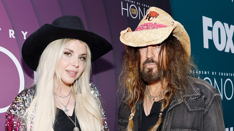 Firerose and Billy Ray Cyrus posing