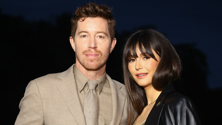 Shaun White and Nina Dobrev posing