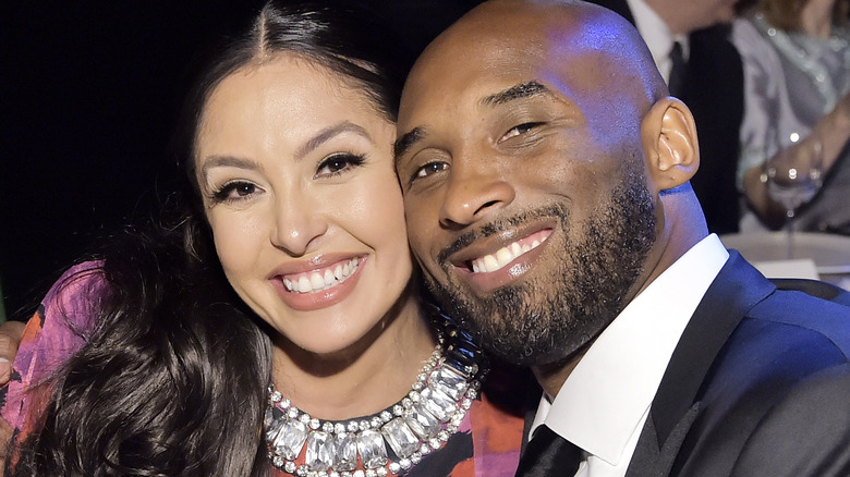 Kobe bryant with wife Vanessa, smiling
