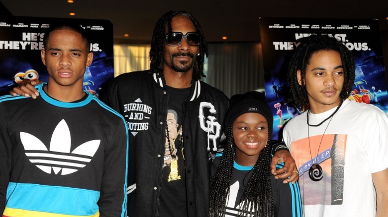 Snoop Dogg and children posing 