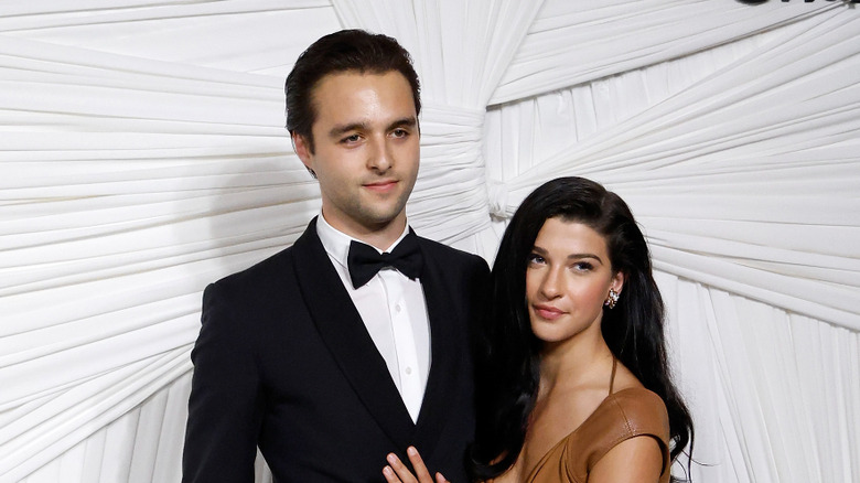 Arthur Donald and Phoebe Gates pose on the red carpet