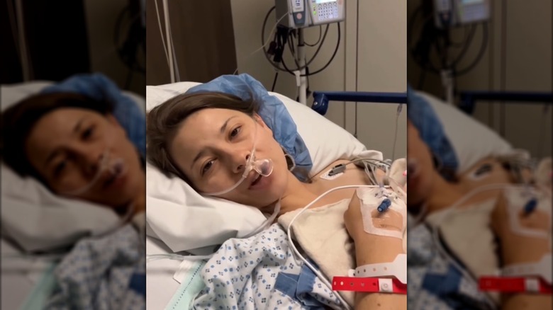 Bindi Irwin recording an Instagram video from her hospital bed
