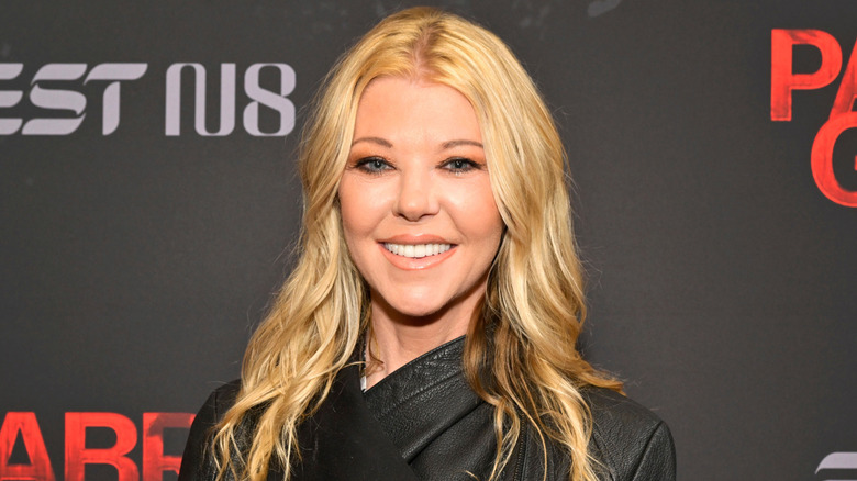 Tara Reid poses in March 2025