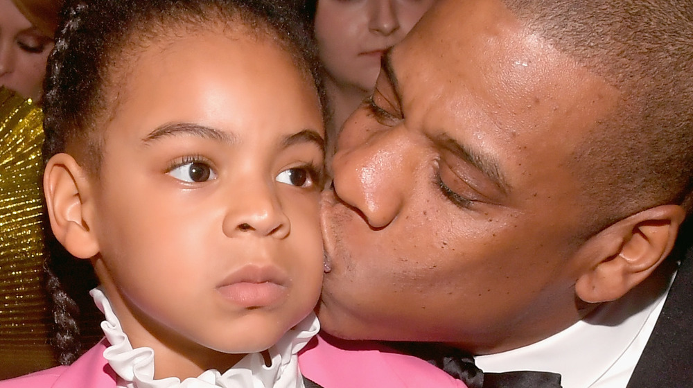 Jay Z kissing Blue Ivy Carter on cheek