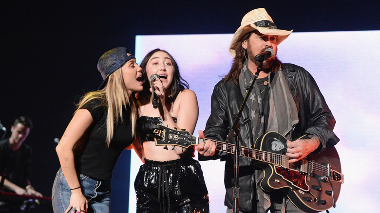 Miley, Noah and Billy Ray Cyrus perform together
