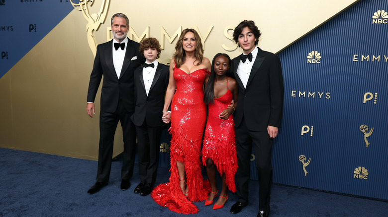 Actor Mariska Hargitay posing with family Peter Hermann, Andrew Hermann, Amaya Hermann, and August Hermann on the 2026 Emmys red carpet.