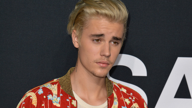 Justin Bieber posing at an event