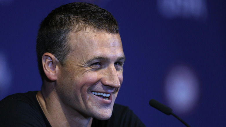 Ryan Lochte grinning at event