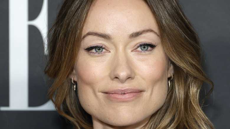 Olivia Wilde smiling at event