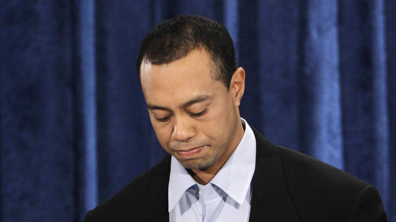 Tiger Woods apologizing for his affairs,