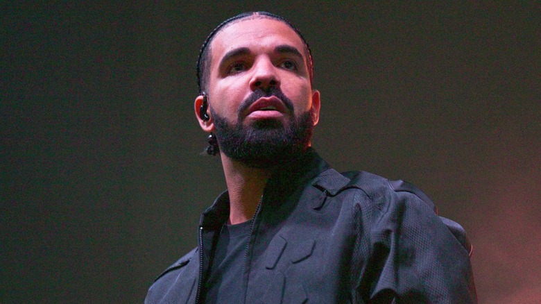 Drake performs in all-black outfit