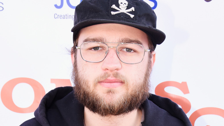 Angus T. Jones posing