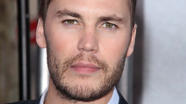 Taylor Kitsch on a red carpet