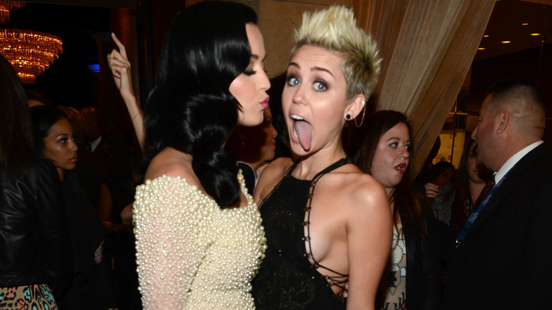Katy Perry making kissy face at Miley Cyrus