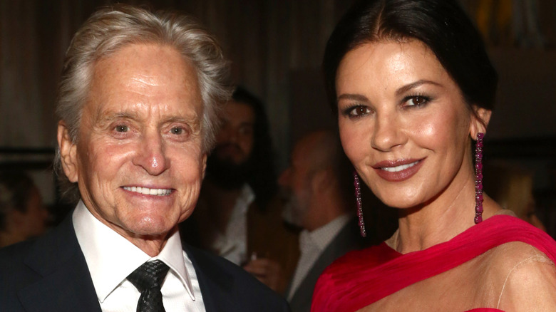 Michael Douglas and Catherine Zeta-Jones pose for a photo