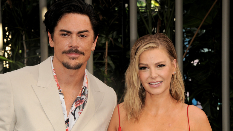 Tom Sandoval and Ariana Madix attending a premiere event for Jurassic World Dominion