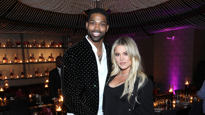 Khloe Kardashian and Tristan Thompson posing for a photo