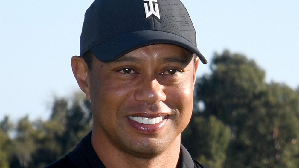 Tiger Woods in branded cap