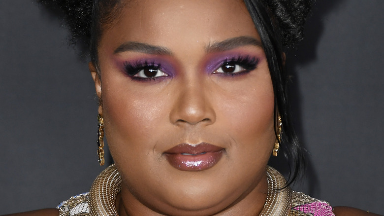 Lizzo looking at camera