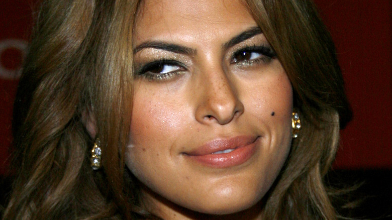 Eva Mendes looking sly on red carpet