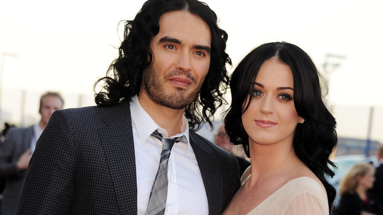 Russell Brand and Katy Perry posing at the European premiere of Arthur