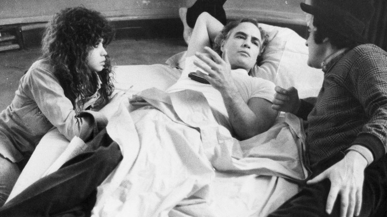 Maria Schneider, Marlon Brando, and Bernardo Bertolucci