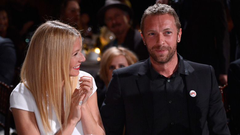 Gwyneth Paltrow smiling at Chris Martin