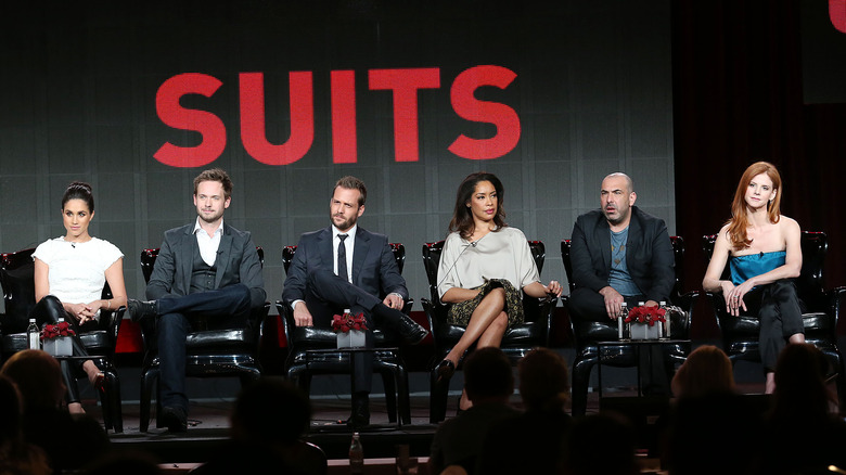Meghan Markle on stage with the cast of Suits