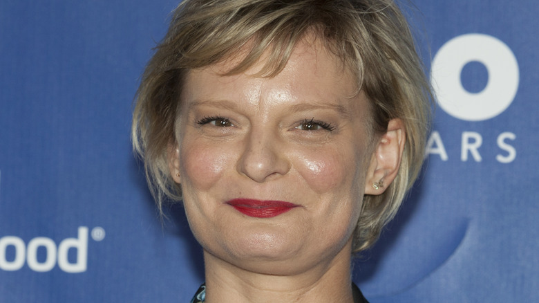 Martha Plimpton smirking