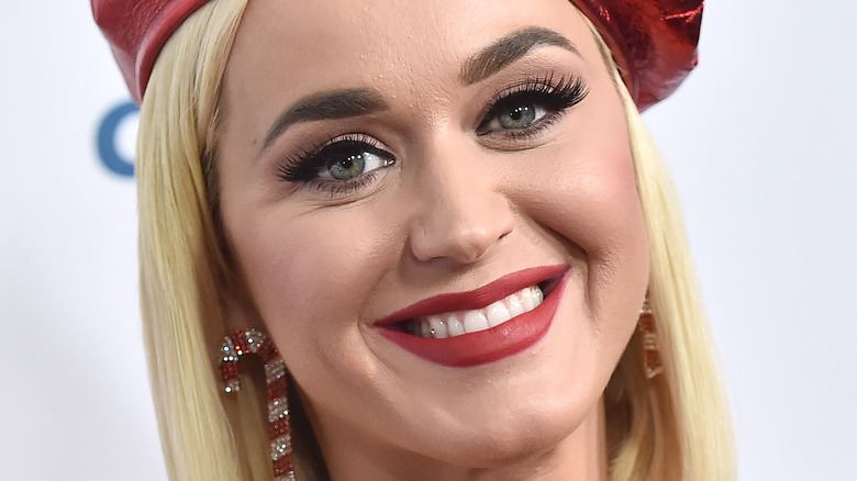 Katy Perry smiling in beret