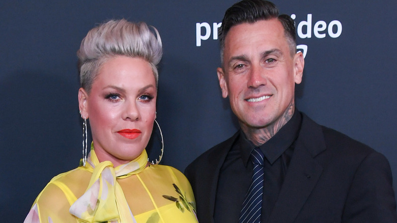 Pink posing with Carey Hart