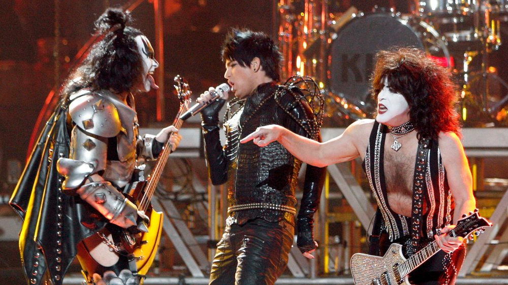 Gene Simmons, Adam Lambert, Paul Stanley all performing on stage
