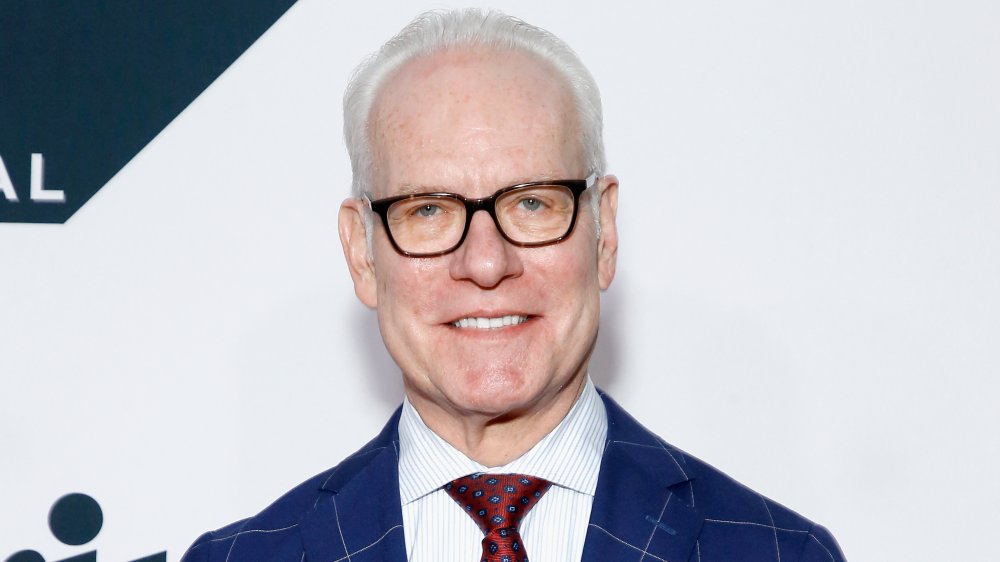 Tim Gunn posing on the red carpet