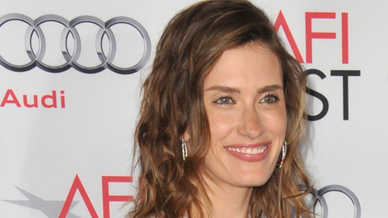 Rhea Durham smiling on red carpet