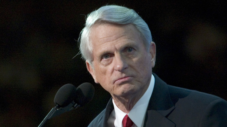 Zell Miller in front of a black background