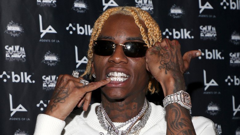 Soulja Boy wearing grills