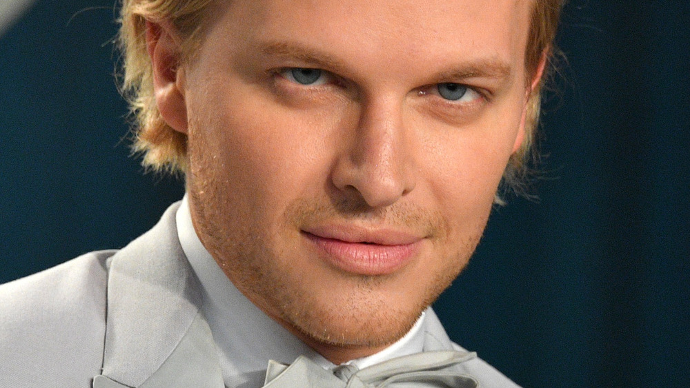 Ronan Farrow poses at the 2020 Vanity Fair Oscar party