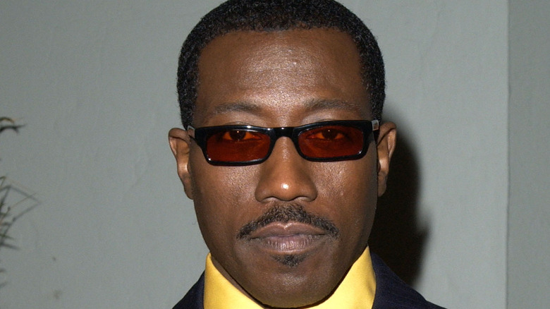 Wesley Snipes posing for cameras