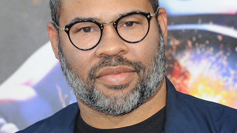Jordan Peele with a straight face on the red carpet