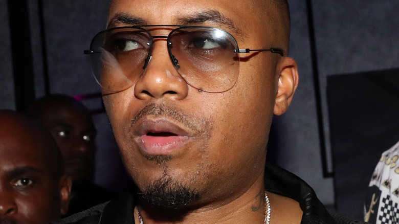 Nas looking left with his mouth open